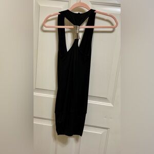Black halter neck dress with a plunging neckline